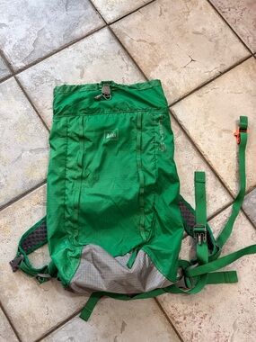 REI green and gray lightweight hiking daypack